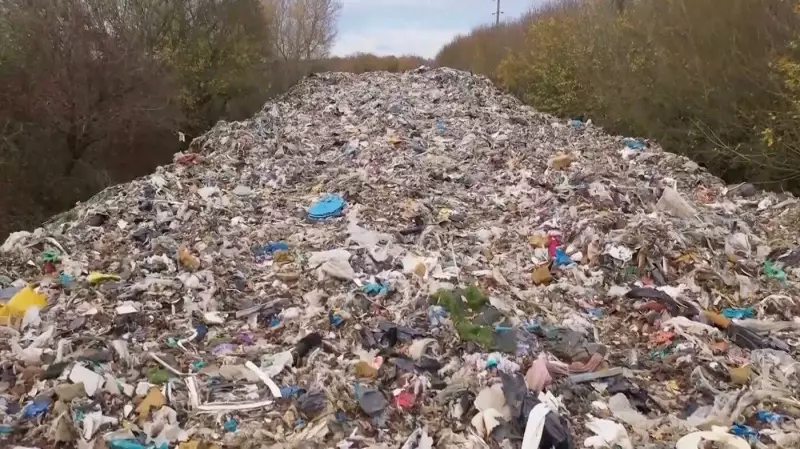 Massive Illegal Trash Dump Near Oxford River Sparks Environmental Outcry