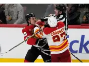 Bedard's Hat-Trick Burns Flames in 5-2 Blackhawks Victory