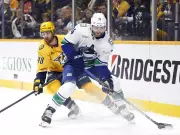 Canucks Captain Quinn Hughes Leads Charge in Thrilling Victory Over Predators