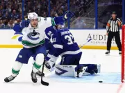 Canucks Rally Behind Quinn Hughes' 4 Assists in 6-2 Victory Over Lightning