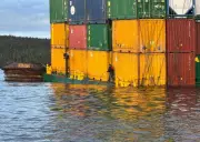 Cargo Unloaded from Sinking Barge Near Bella Bella, B.C.