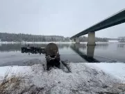 Environmental Emergency: Bitumen Tanker Spill Contaminates North Saskatchewan River After Highway Crash