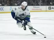 Quinn Hughes Shines in Canucks' Dominant Victory Over Minnesota Wild