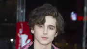 Timothée Chalamet Defied Publicist Over 2017 Pink Raincoat Fashion