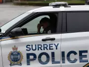 Woman Injured in Targeted Shooting at Surrey Home, Police Investigate