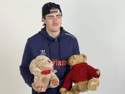 Woodall's Record Goal Sparks Teddy Bear Toss Win for Windsor Spitfires