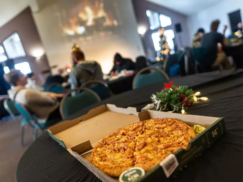 Calgary's Homeless Find Warmth, Pizza at Church Amid Christmas Chill