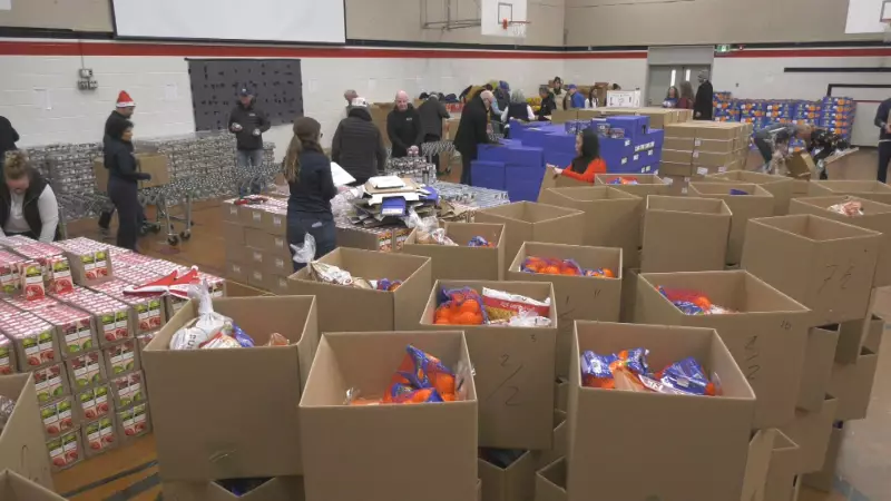 Edmonton Volunteers Pack Hundreds of Holiday Meals for Delivery