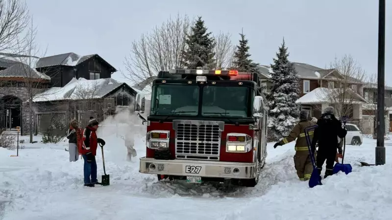 Winnipeg neighbours dig out fire truck trapped in snow after winter storm