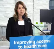 Alberta Premier's Shift on Health and Education Sparks Debate Over Lougheed's Legacy