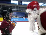 Calgary's Festive Weekend: Flames Players Volunteer, Santa Shuffle Draws Crowds