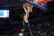 Canadian Teen Olivier Rioux, World's Tallest, Scores First College Dunk