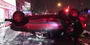 Driver Flees After Multi-Vehicle Crash Flips Car in Toronto's West End