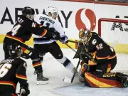 Flames Surge Continues: Wolf's Shutout Leads Calgary to 2-0 Win Over Utah