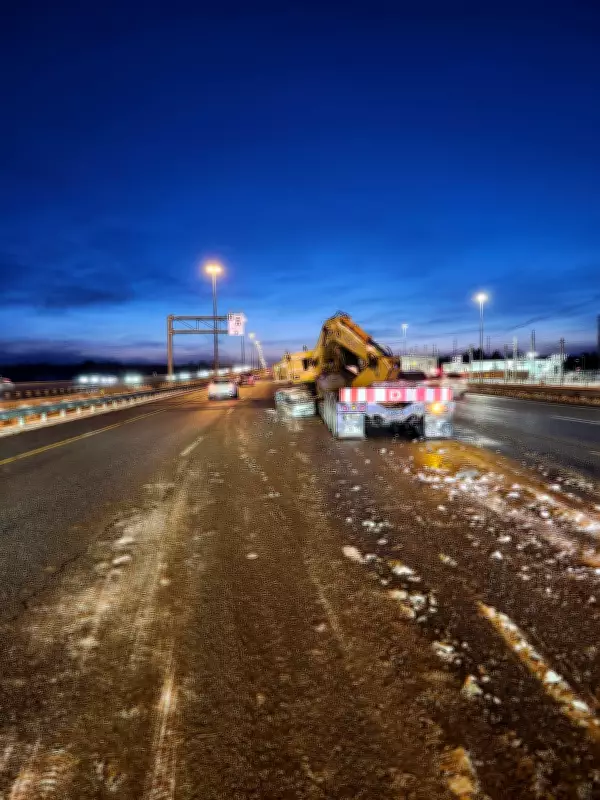 Excavator Falls from Transport, Blocks Lanes on Ottawa's Highway 417