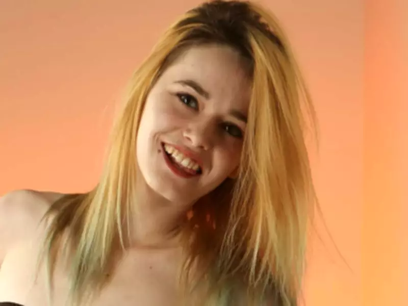 SUNshine Girl Tabatha: Toronto Model with Green Hair and Pet Lizard