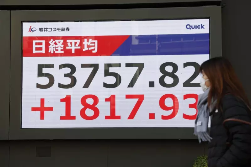 Tokyo Hits Record High, Tracking Wall Street as Global Shares Mixed