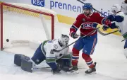 Canadiens' Alexandre Carrier Shines in 6-3 Victory Over Canucks