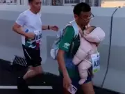 Hong Kong Marathon Runner Investigated for Child Abuse After Running with Baby