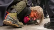 Minneapolis Photographer Tosses Camera to Save It from Federal Agents During ICE Protest