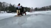 Quebec Man's Homemade Zamboni Transforms Backyard Rink on Long Lake