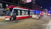 Two Hospitalized After Vehicle and Streetcar Collide on Queen Street West in Toronto