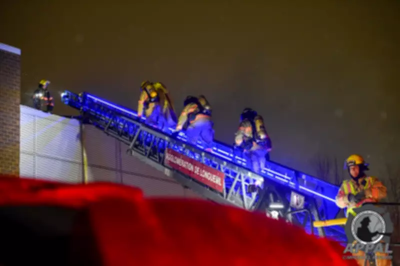 Major Building Fire in Longueuil Forces Extensive Road Closures, Firefighters Battle Blaze