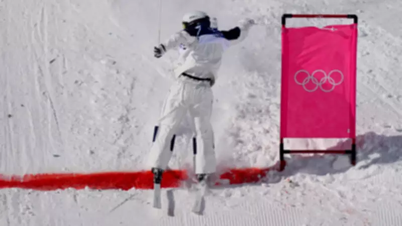 Olympic Moguls Madness: Skier Wins Backwards After Opponent's Crash