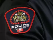 Calgary Police Arrest Suspect with 25 Warrants After Balcony Escape Attempt