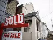 Canadian Mortgage Debt Nears $2 Trillion Mark Amid Rising Delinquencies