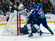 Canucks' Trade Deadline Drama Overshadows Overtime Loss to Jets