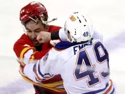 Edmonton Oilers Fall to Calgary Flames Due to Defensive Lapses and Goaltending Issues