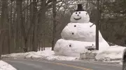 Father Builds 20-Foot Snowman for Daughter After Winter Storms in Shirley