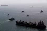 Iran and Russia Conduct Joint Naval Drills as U.S. Carrier Approaches Mideast