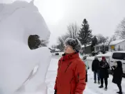 Kirkland Artist Honors Chinese Culture with Life-Size Snow Horse Sculpture