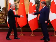 Lilley Warns of Perilous Media Ties Between Canada and China