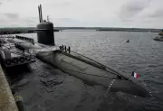 Macron's Secret Submarine Base Visit Amid European Nuclear Doubts