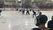 Military Members Drop Puck in Annual Hockey Game to Combat Food Insecurity