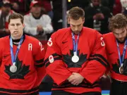 Nathan MacKinnon's Unimpressed Reaction to Olympic Stuffed Animal Goes Viral