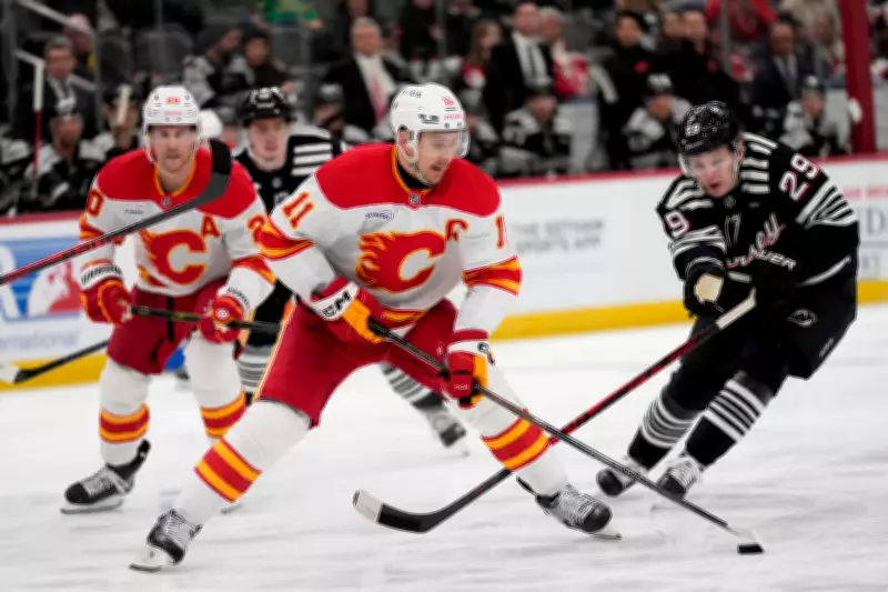Backlund Hits 600 Points, Beecher Scores Twice in Flames' 5-4 Victory Over Devils
