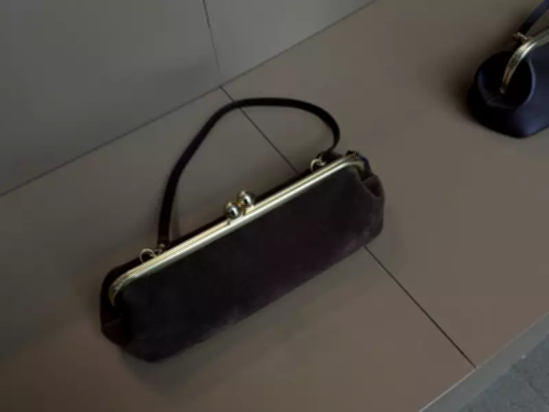 Coach's Spring Handbag Trends: East-West Silhouettes and Book Charms Lead