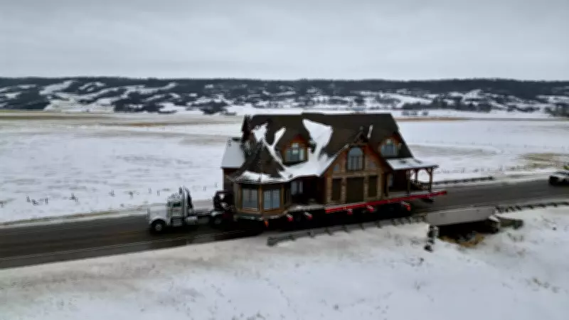 Massive Log Home Nears Journey's End After Epic Transport from Lajord