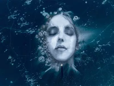 Artist Battles Chinook Winds to Create Ephemeral Ice Portraits on Alberta's Abraham Lake