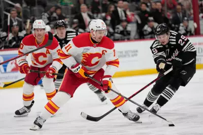 Backlund Hits 600 Points, Beecher Scores Twice in Flames' 5-4 Victory Over Devils