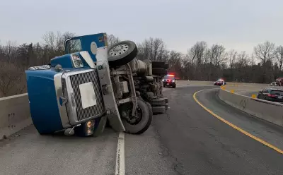 Recycling Truck Overturns on Highway Ramp in Ancaster, Causing Traffic Disruption