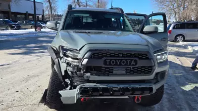 Stolen Truck Collision in Calgary Leads to Arrests of Two Red Deer Men