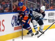 Adam Henrique Embraces Defensive Role Amid Scoring Drought, Remains Team-Focused