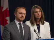 Alberta Premier Smith Faces Criticism Over MAID Policy Changes and Library Book Bans