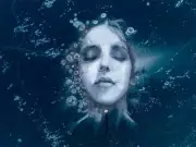 Artist Battles Chinook Winds to Create Ephemeral Ice Portraits on Alberta's Abraham Lake