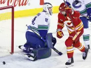 Canucks' Defensive Woes Exposed in 7-3 Loss to Flames, Pettersson Frustrated